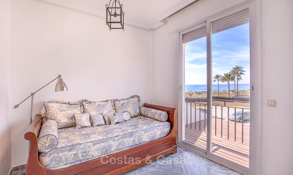 Spacious semi-detached house with magnificent sea views for sale, in a prestigious beach front complex - East Marbella 10047