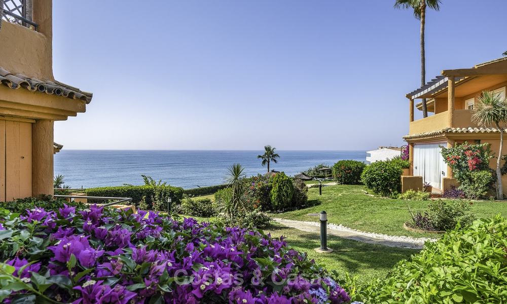 Spacious, fully renovated beachfront townhouse for sale in Estepona. Direct access to the beach and the beach promenade via the communal gardens. 15153