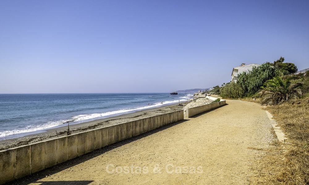 Spacious, fully renovated beachfront townhouse for sale in Estepona. Direct access to the beach and the beach promenade via the communal gardens. 15172