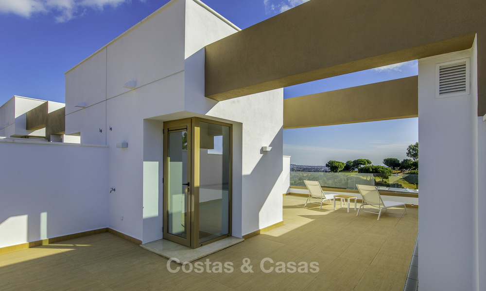 New, move-in ready, modern townhouses for sale on an acclaimed golf resort in Mijas, Costa del Sol. 10% discount! 15679