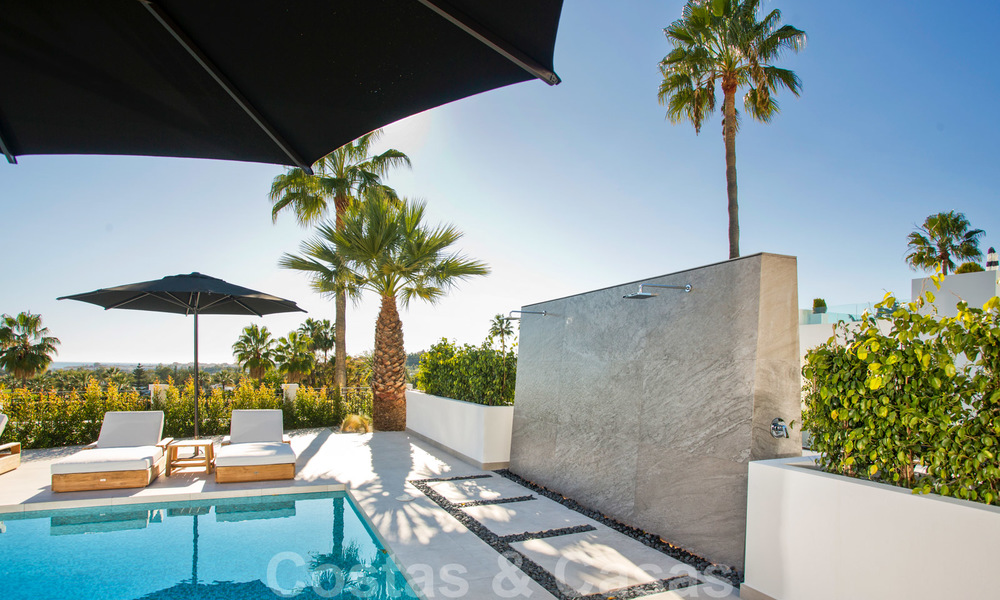 Delightful, completely renovated luxury villa with golf and sea views for sale in Nueva Andalucía, Marbella 19845