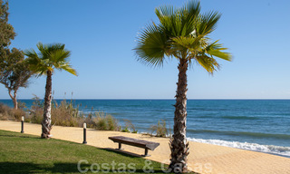 Modern garden apartment for sale in a frontline beach complex with private pool between Marbella and Estepona 25673 