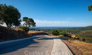Building plots for sale with panoramic sea and mountain views on a luxury estate in Marbella - Benahavis 32271 