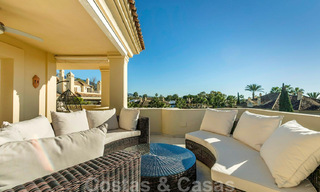 Spacious luxury penthouse with panoramic views for sale on a golf course in Nueva Andalucia, Marbella 32084 