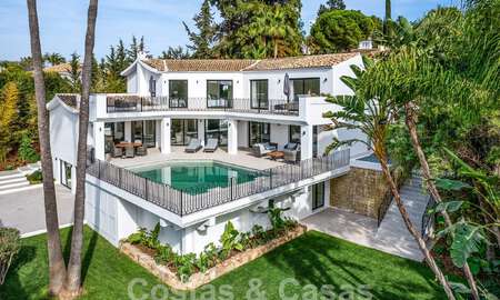 Spacious luxury villa for sale with a traditional architectural style located in a preferred residential area on the New Golden Mile, Marbella - Benahavis 55006