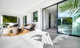 Modern luxury villa for sale in a contemporary architectural style, walking distance from Puerto Banus, Marbella 59620 